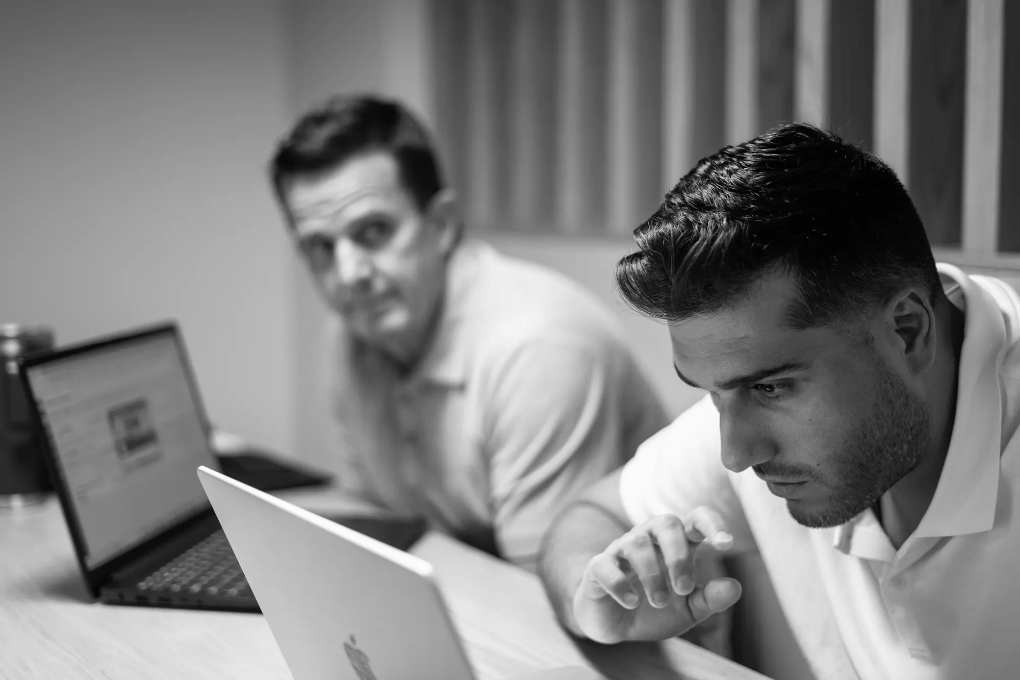 Two of the Anchor team working through a delivery problem